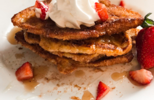 churro croissant french toast Pinterest image that says "easy & delicious churro croissant french toast"