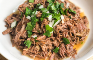 slow cooker barbacoa featured Pinterest image with title